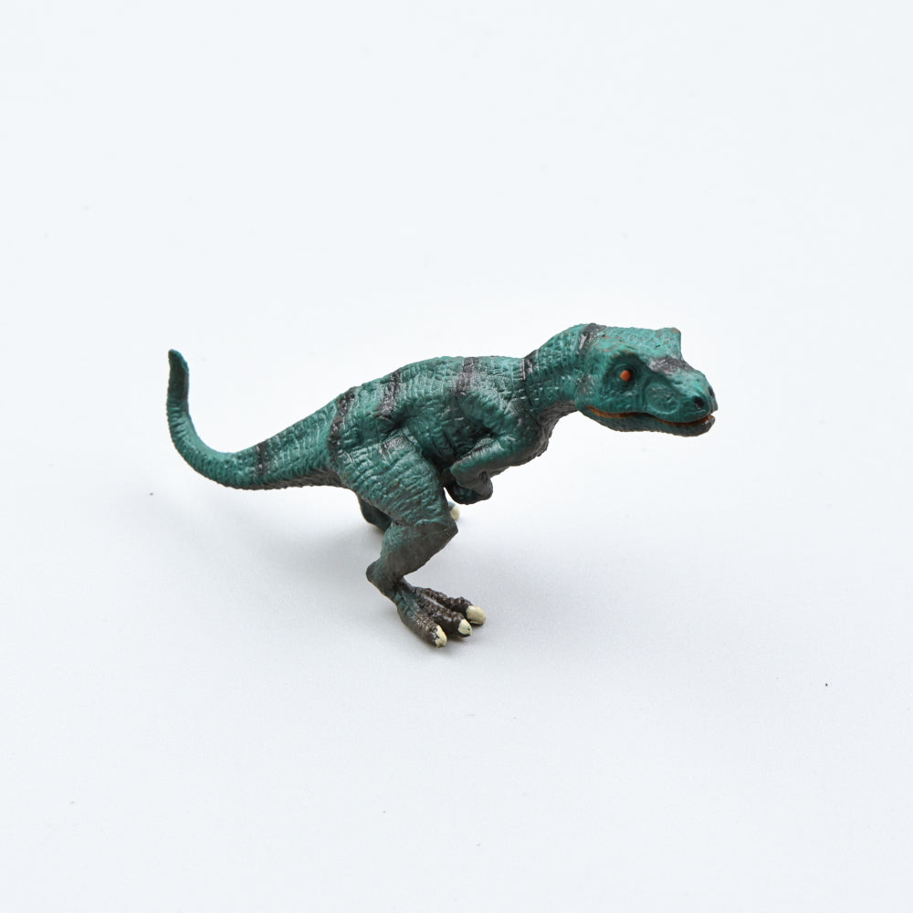 Small Green Dinosaur Figurine